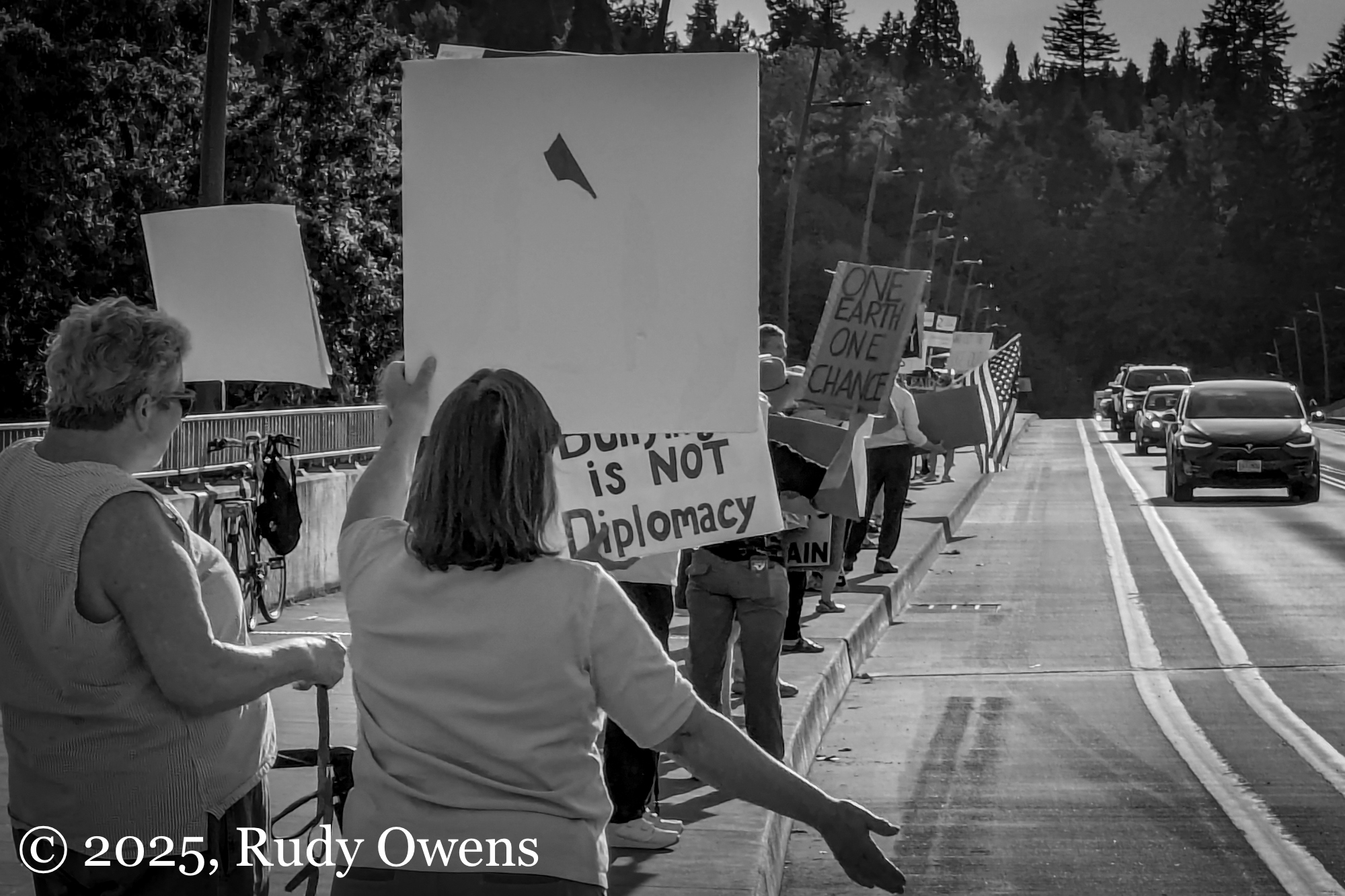 Signs at protest Sellwood Bridge